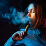 Girl,Is,Engaged,In,Vaping.,Young,Vaper,Woman,On,Black